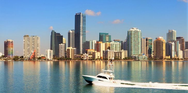 Fishing boat passing the Miami Skyline