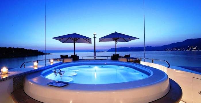 Relax in a luxurious jacuzzi as you cruise into the sunset