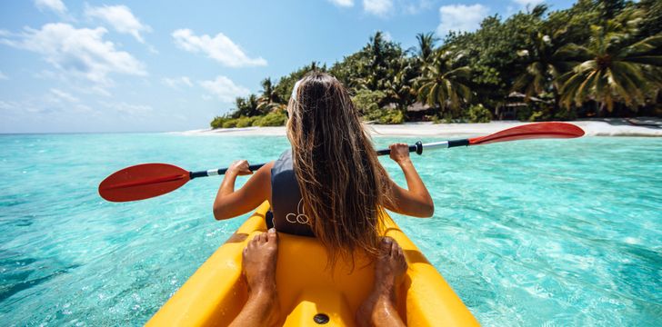 Romantic Couple Kayak in the Bahamas