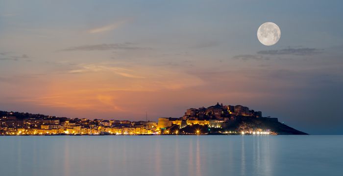 The sun setting over Calvi in Corsica