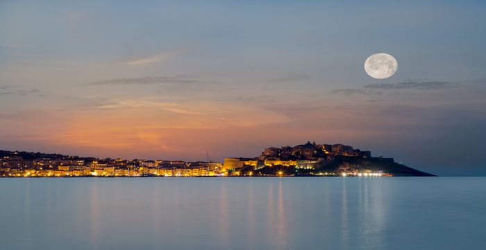 The sun setting over Calvi in Corsica