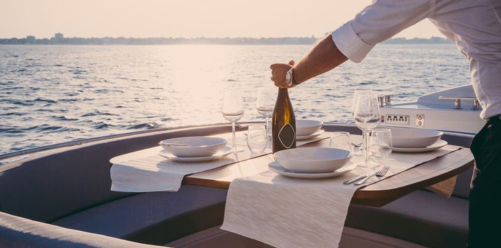 yacht charter,yachts,champagne,crew,dinner,evening,sunset