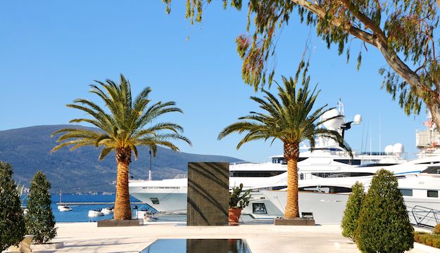 Berthed Super Yachts at the port of Kotor