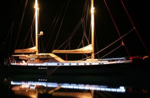 Gulet fishing boat lit up at night