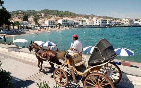Cars are banned from the island of Spetses so locals get around the 'old-fashioned' way!