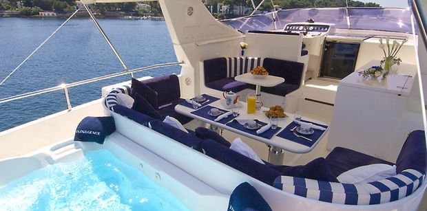 Enjoy the flybridge jacuzzi on INDULGENCE OF POOLE