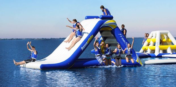 Enjoy inflatable playgrounds floating in the sea by your yacht!