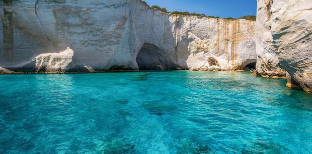 Explore the coves and inlets scattered throughout the stunning blue waters of the Greek islands