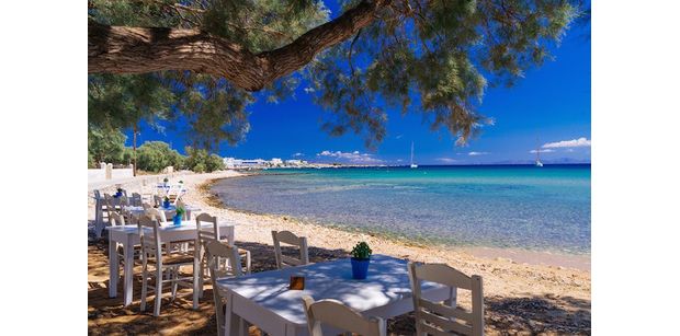 Sit back in the Greek sunshine and enjoy lunch in a typical taverna