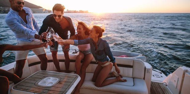 A group Celebration with Champagne onboard a Yacht