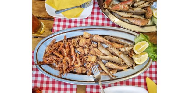 freshly fried shrimp, squid, and small fish served at a restaurant in Split along Croatia’s coast