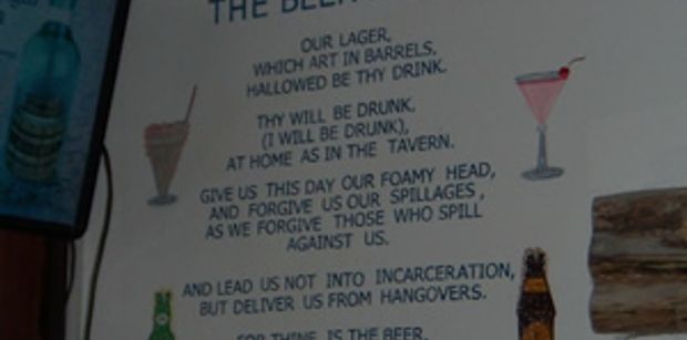 A sign in a bar in Belize
