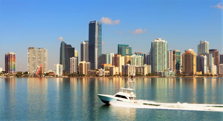 Fishing boat passing the Miami Skyline