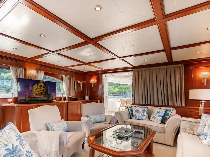 IMAGINE Ferretti Custom Line Navetta 30 - main saloon seating with TV IMAGINE Ferretti Custom Line Navetta 30 - main saloon seating with TV
