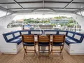 LIBERTE IV Falcon 100 - flybridge dining area LIBERTE IV Falcon 100 - flybridge dining area