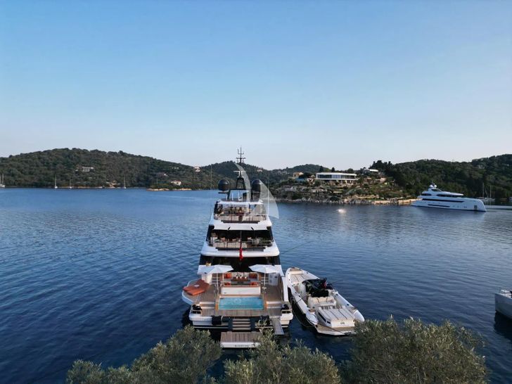 HOW MUCH IS ENOUGH Benetti Oasis 40m - anchored with the chase boat HOW MUCH IS ENOUGH Benetti Oasis 40m - anchored with the chase boat
