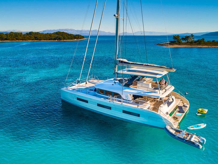 AMADA MIA Lagoon 65 - aerial shot with water toys AMADA MIA Lagoon 65 - aerial shot with water toys