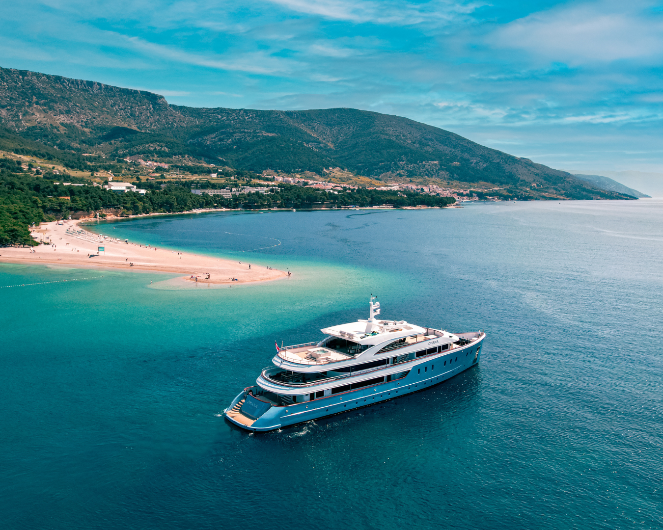 OHANA Custom 49m - anchored near an island