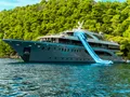 FREEDOM Custom 48m - anchored with the water slide set up FREEDOM Custom 48m - anchored with the water slide set up