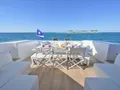 TOTAL Mangusta 108 - aft deck alfresco dining area TOTAL Mangusta 108 - aft deck alfresco dining area
