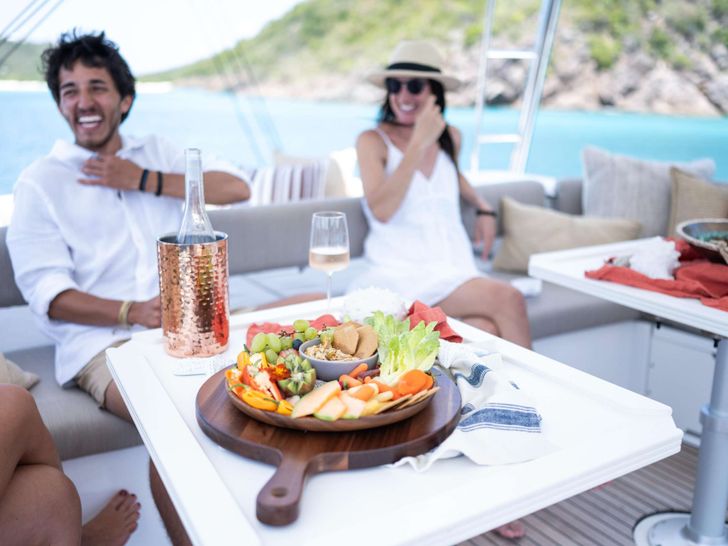 SUN DAZE Bali 5.4 - guests having a wine party on the flybridge SUN DAZE Bali 5.4 - guests having a wine party on the flybridge
