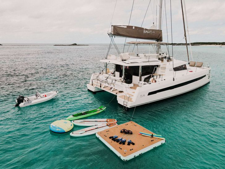 ZURI 3 Bali 5.4 - anchored aft shot with the water toys ZURI 3 Bali 5.4 - anchored aft shot with the water toys