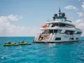 EROS Ferretti Custom Line Navetta 37 - anchored aft shot with the water toys EROS Ferretti Custom Line Navetta 37 - anchored aft shot with the water toys
