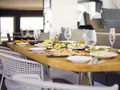 TRIWING ENDOR Summer Lagoon Sixty5 - main aft deck alfresco dining set up TRIWING ENDOR Summer Lagoon Sixty5 - main aft deck alfresco dining set up