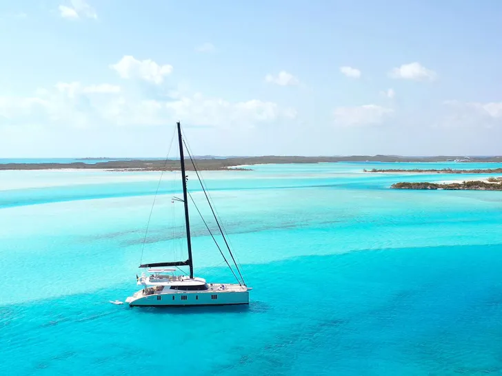 INDABLUE Sunreef 74 - anchored amidst the turquoise water INDABLUE Sunreef 74 - anchored amidst the turquoise water