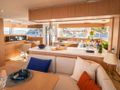 DREAM ON Bali 5.8 - saloon seating and galley DREAM ON Bali 5.8 - saloon seating and galley