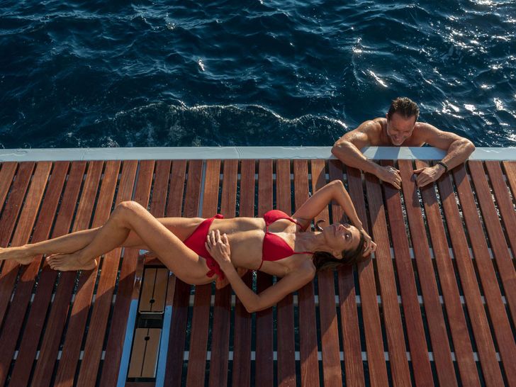 CHRISTAL MIO 80 Fountaine Pajot Thira 80 - guests on the swim platfrom CHRISTAL MIO 80 Fountaine Pajot Thira 80 - guests on the swim platfrom