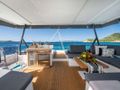 LYRA Fountaine Pajot Alegria 67 - flybridge seating and dining area with a minibar LYRA Fountaine Pajot Alegria 67 - flybridge seating and dining area with a minibar