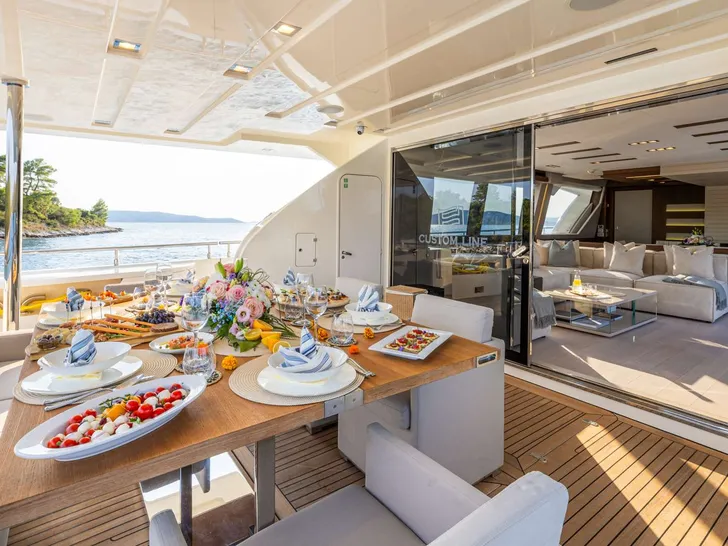 MORNING STAR Ferretti Custom Line 100 - aft deck alfresco dining set up MORNING STAR Ferretti Custom Line 100 - aft deck alfresco dining set up