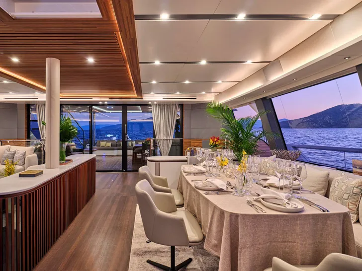 ALINA Fountaine Pajot Power 80 - indoor dining set up ALINA Fountaine Pajot Power 80 - indoor dining set up