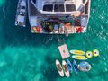 ALINA Fountaine Pajot Power 80 - aft shot with the water toys ALINA Fountaine Pajot Power 80 - aft shot with the water toys