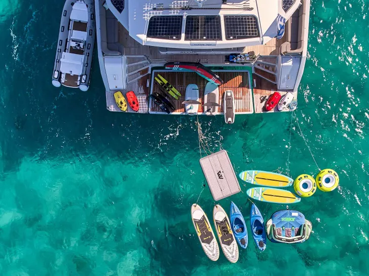 ALINA Fountaine Pajot Power 80 - aft shot with the water toys ALINA Fountaine Pajot Power 80 - aft shot with the water toys