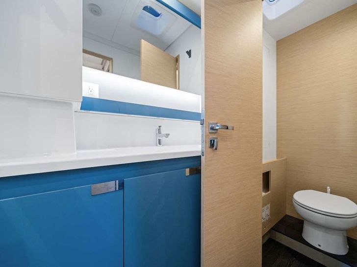 HALCYON Fountaine Pajot Aura 51 - master cabin bathroom vanity and toilet HALCYON Fountaine Pajot Aura 51 - master cabin bathroom vanity and toilet