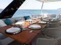 SPIRIT OF PONANT Lagoon Seventy 7 - main aft deck alfresco dining set up SPIRIT OF PONANT Lagoon Seventy 7 - main aft deck alfresco dining set up