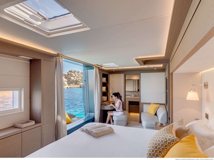 LA DÉSIRADE Lagoon Seventy 7 - master cabin work space,couch,and balcony LA DÉSIRADE Lagoon Seventy 7 - master cabin work space,couch,and balcony