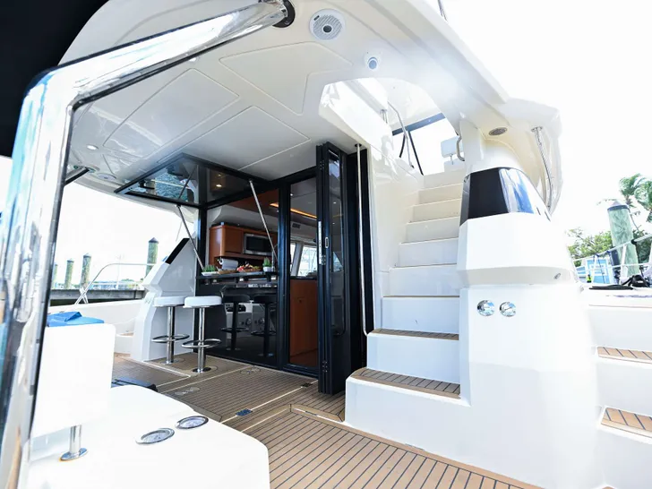 BEACH BOOMER Aquila 44 - Aft Deck and Stairs to Flybridge BEACH BOOMER Aquila 44 - Aft Deck and Stairs to Flybridge