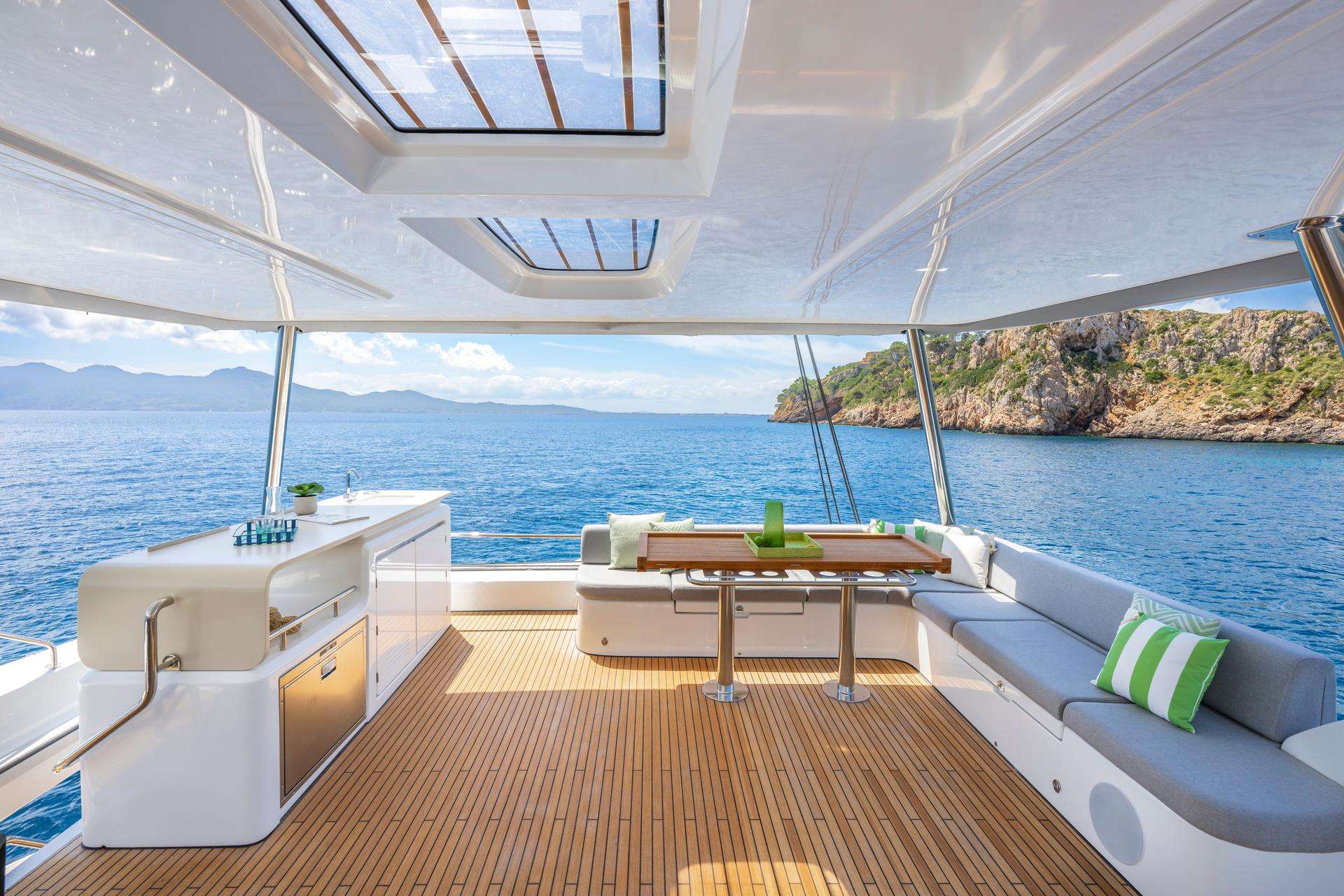 GRACE 60 Lagoon 60 - flybridge dining area and kitchenette