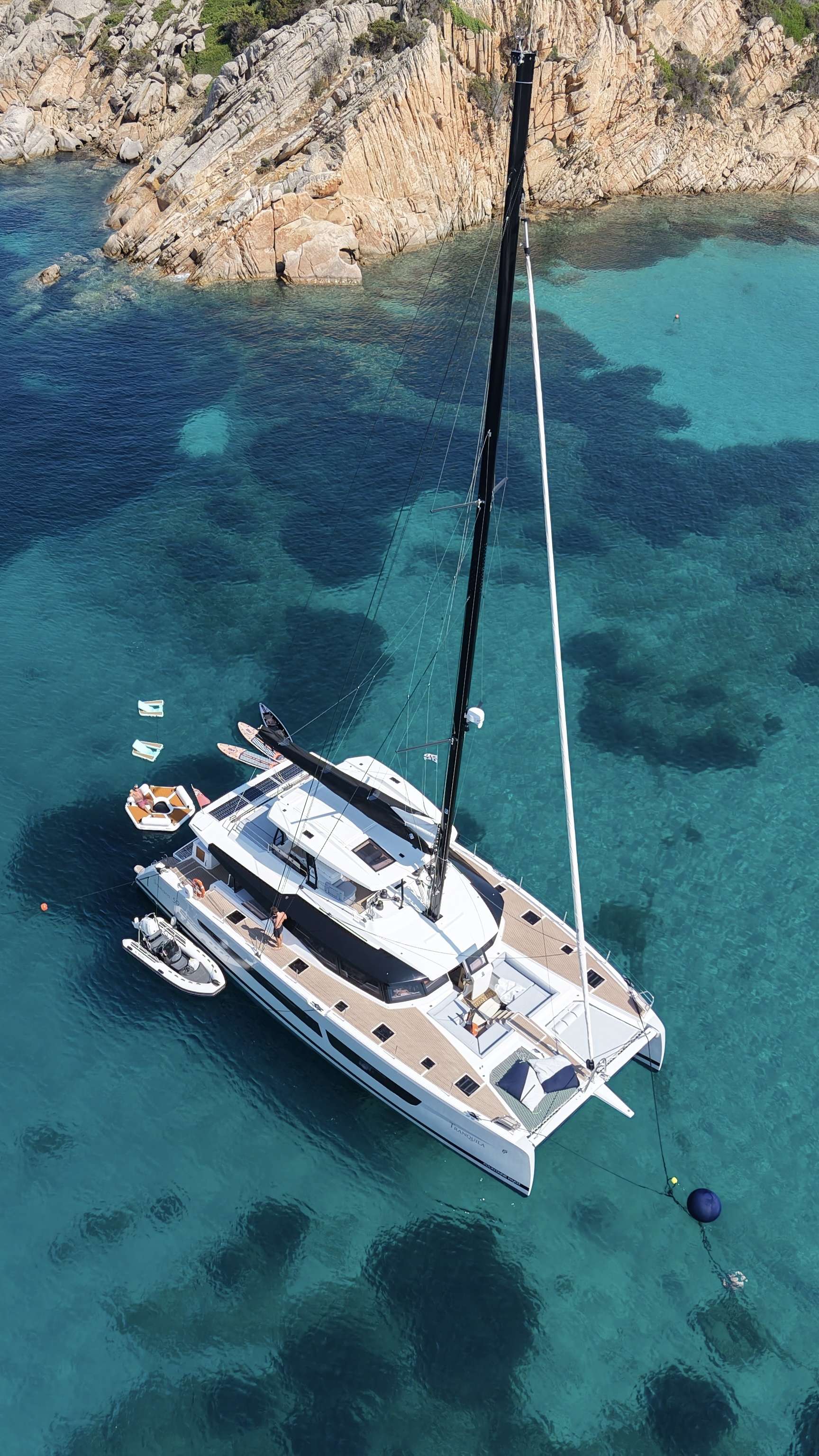TRANQUILA Fountaine Pajot Samana 59 - anchored aerial shot