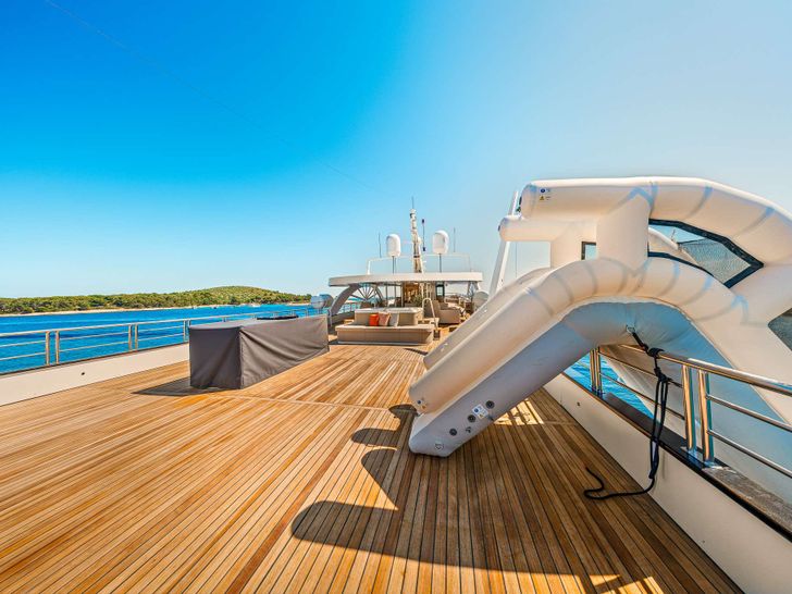 PREMIER Custom 55m Superyacht - water slide set up from the sundeck PREMIER Custom 55m Superyacht - water slide set up from the sundeck