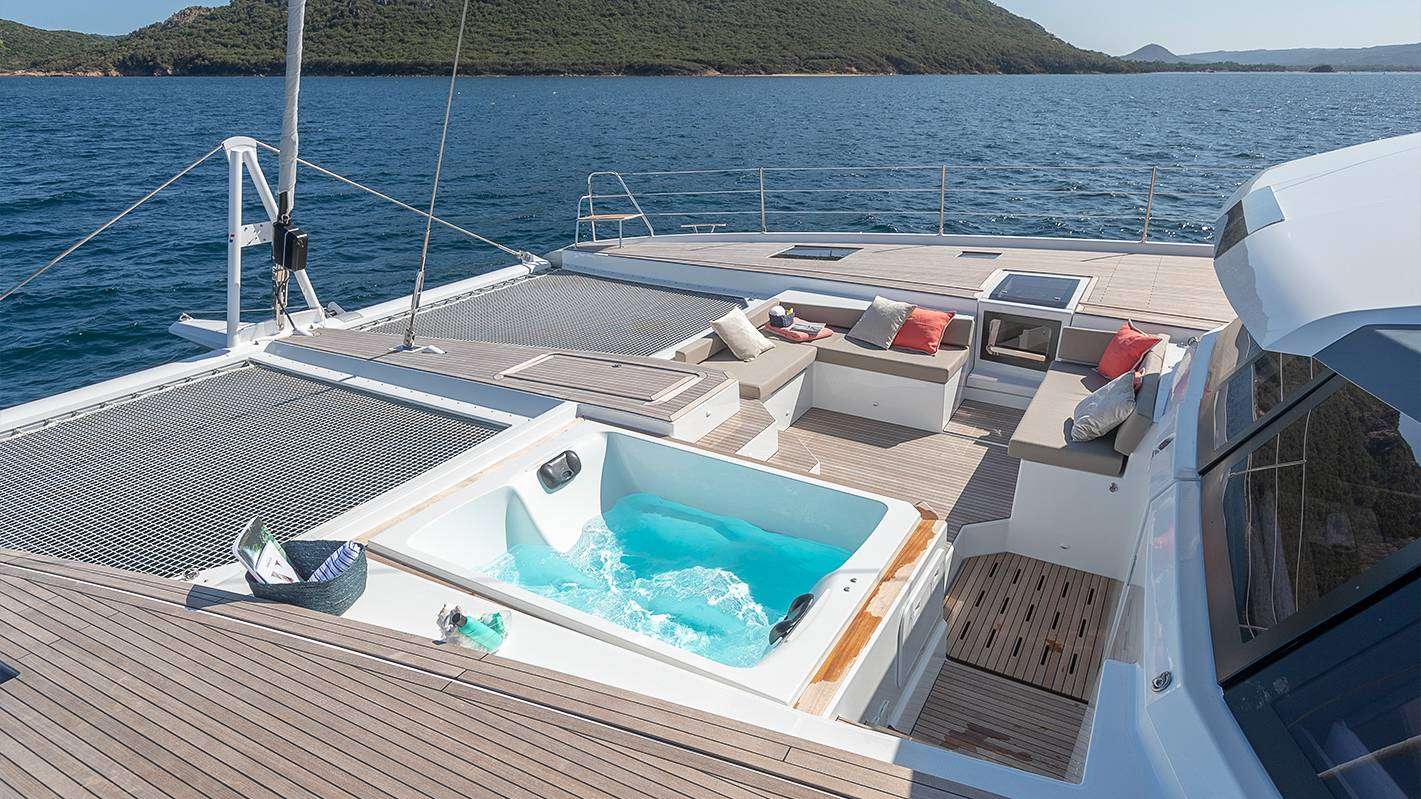 ENCORE Fountaine Pajot Alegria 67 - foredeck lounge and jacuzzi
