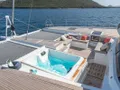 ENCORE Fountaine Pajot Alegria 67 - foredeck lounge and jacuzzi ENCORE Fountaine Pajot Alegria 67 - foredeck lounge and jacuzzi