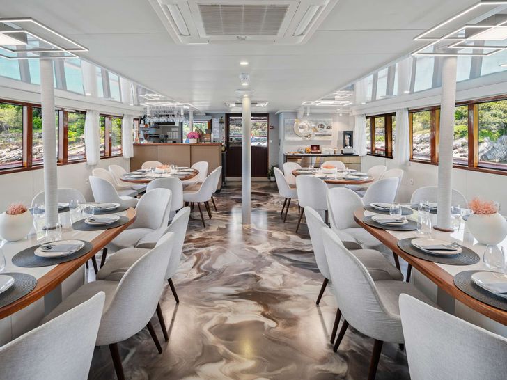 CARPE DIEM Custom Aluminum Cutter 118 - indoor dining area CARPE DIEM Custom Aluminum Cutter 118 - indoor dining area