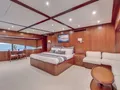 SEVEN SPICES 39-meter Custom Aluminum Cutter - master cabin bed and lounge SEVEN SPICES 39-meter Custom Aluminum Cutter - master cabin bed and lounge