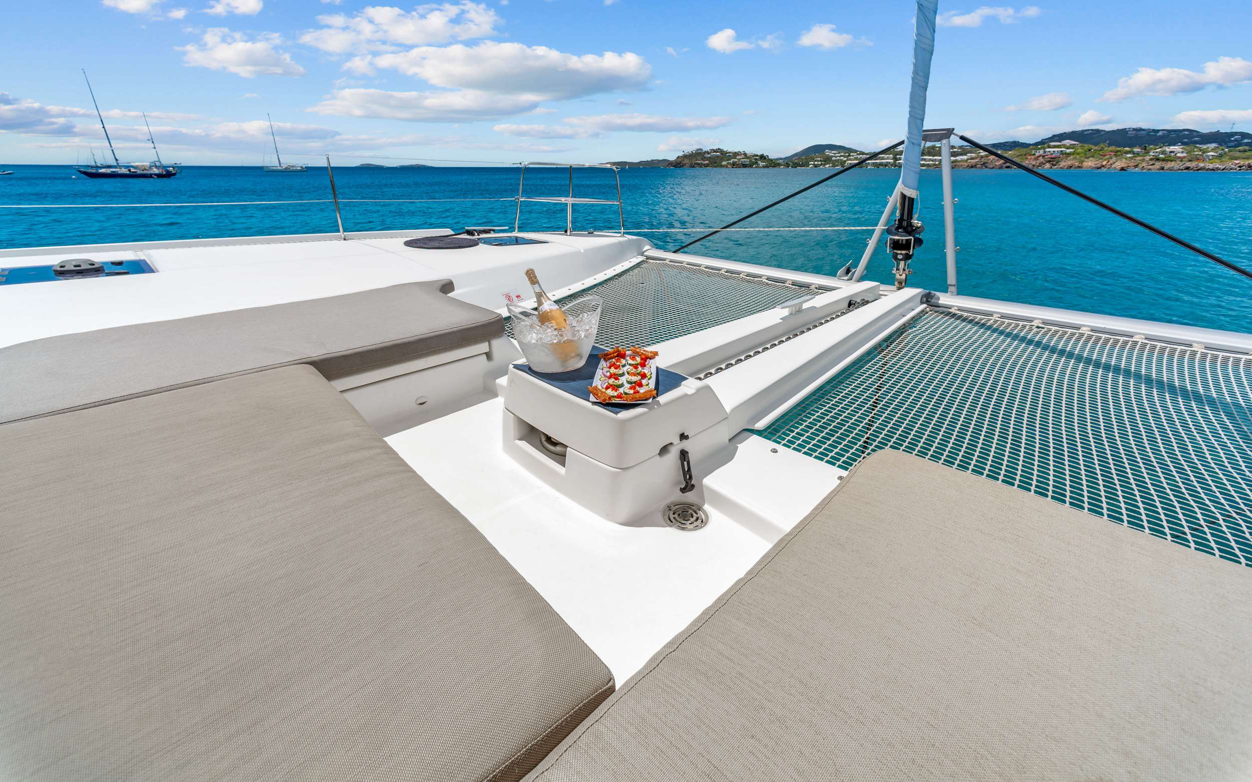 OCEANS 8 Lagoon 46 - foredeck sunbathing area and net trampolines