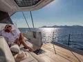 MAGIC MOMENTS 3 Fountaine Pajot Thira 80 - guest enjoying the sun MAGIC MOMENTS 3 Fountaine Pajot Thira 80 - guest enjoying the sun