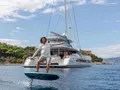 MAGIC MOMENTS 3 Fountaine Pajot Thira 80 - anchored while e-Foiling MAGIC MOMENTS 3 Fountaine Pajot Thira 80 - anchored while e-Foiling